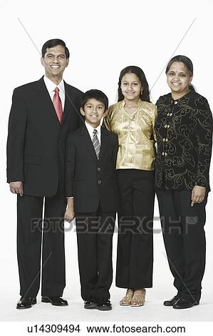 Portrait of parents standing with their son and daughter View Large Photo Image Picture - Portrait of parents standing with their son and daughter. Fotosearch