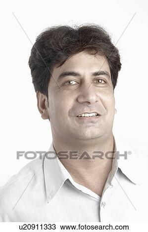 Portrait of a young man smiling View Large Photo Image Stock Image - Portrait of a young man smiling. Fotosearch