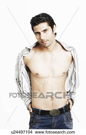 Portrait of a young man standing View Large Photo Image Picture - Portrait of a young man standing. Fotosearch