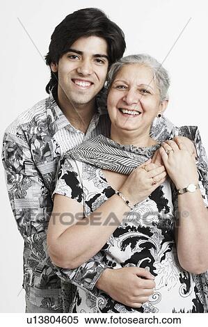 Portrait of a young man with his grandmother View Large Photo Image Stock Photography - Portrait of a young man with his grandmother. Fotosearch