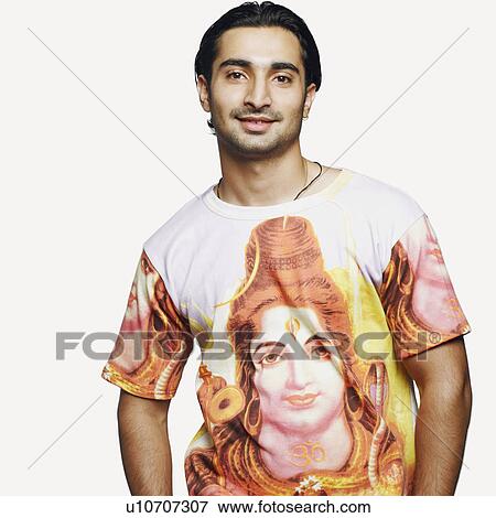 Stock Photo - Portrait of a young man smiling. Fotosearch