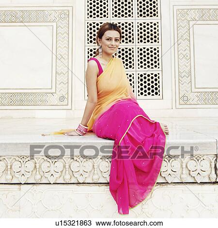 Portrait of a young woman sitting in a mausoleum, Taj Mahal, Agra, Uttar Pradesh, India View Large Photo Image Stock Image - Portrait of a young woman sitting in a mausoleum, Taj Mahal, Agra, Uttar Pradesh, India. Fotosearch