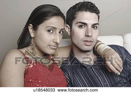 Stock Image - Portrait of a young couple. Fotosearch
