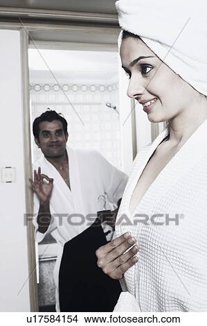 Picture - Young man looking at a young woman. Fotosearch