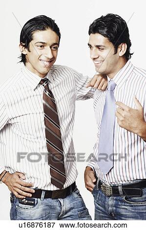 Two businessmen talking View Large Photo Image Stock Photo - Two businessmen talking. Fotosearch