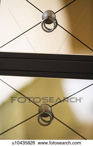 Stock Photograph - Contemporary cabinet drawers with mirrors. Fotosearch