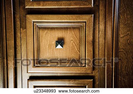 Dark wood drawer with chrome knob View Large Photo Image Stock Image - Dark wood drawer with chrome knob. Fotosearch