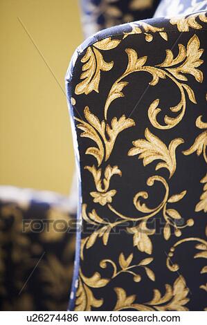 Stock Photograph - Detail of Gold and Black Armchair. Fotosearch