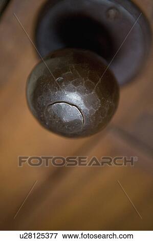 Stock Photo - Detail of iron door knob, close up. Fotosearch