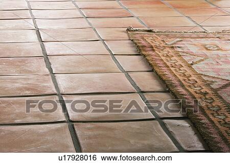 Detail of Tile Floor and Rug View Large Photo Image Stock Photograph - Detail of Tile Floor and Rug. Fotosearch