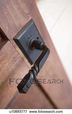 Stock Photo - Wrought iron door knob, close up. Fotosearch
