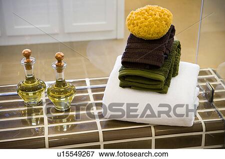 Stock Photo - Bathing items on shower bench. Fotosearch
