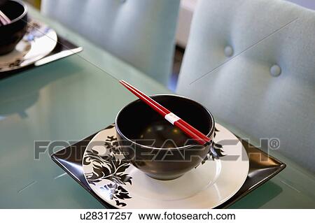 Contemporary Dining Table with Place Settings and Chopsticks View Large Photo Image Stock Photo - Contemporary Dining Table with Place Settings and Chopsticks. Fotosearch