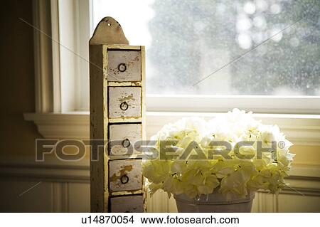 Picture - Country Style Decorations in Front of a Window. Fotosearch