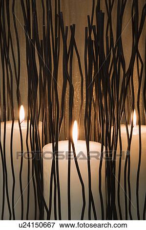 Decorative display of candles and branches View Large Photo Image Stock Photo - Decorative display of candles and branches. Fotosearch