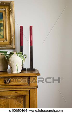 Detail of furniture with candles and pots. View Large Photo Image Picture - Detail of furniture with candles and pots.. Fotosearch