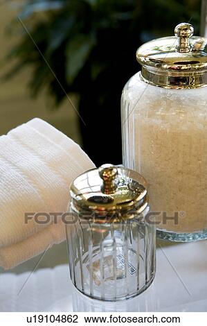 Stock Image - Jar of Bath Salts on Glass Counter. Fotosearch