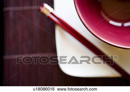 Stock Photograph - Magenta and White Place Setting with Chopsticks. Fotosearch