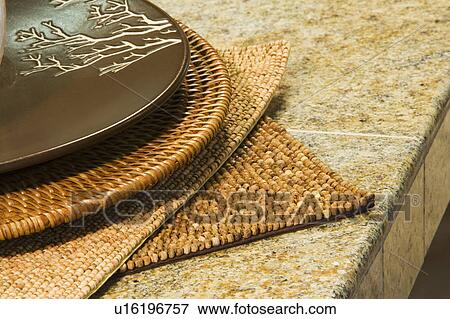 Stock Photo - Plate and Wicker Placemat. Fotosearch