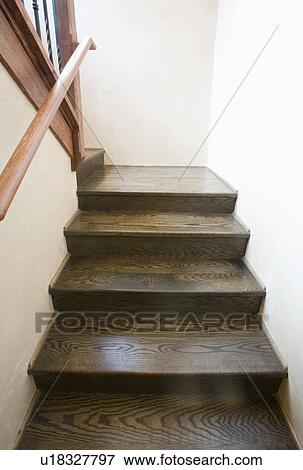 Ascending hardwood stairs View Large Photo Image Stock Photo - Ascending hardwood stairs. Fotosearch