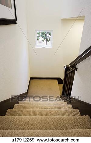 Stock Photo - Stairwell with beige carpeting. Fotosearch
