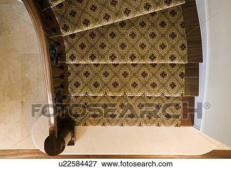 Traditional and Elegant Stairway with Wrought Iron and Wood Bannister View Large Photo Image Stock Photo - Traditional and Elegant Stairway with Wrought Iron and Wood Bannister. Fotosearch