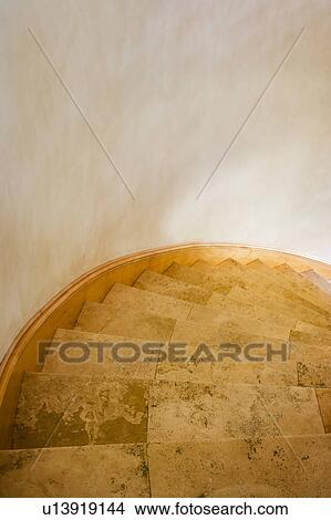 Picture - View from Above of Curved Stone Staircase. Fotosearch