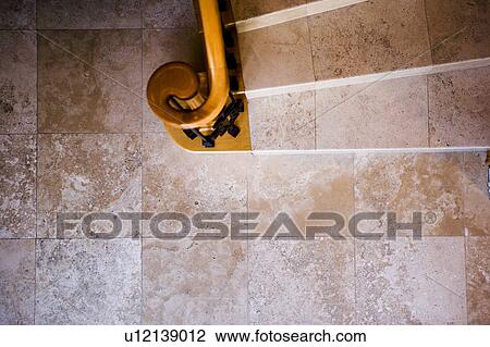Stock Image - View from Above of Curved Stone Staircase. Fotosearch