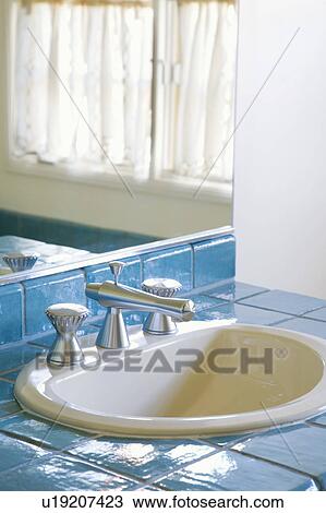 Stock Image - Bathroom with Blue Tile. Fotosearch