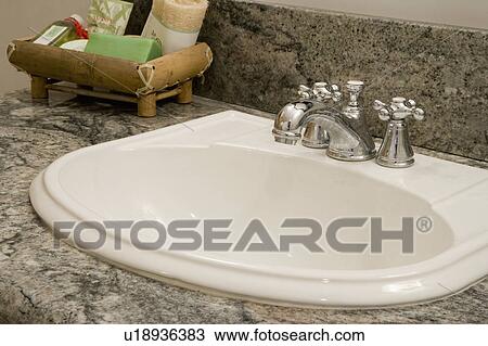 Detail of bathroom faucet with a bamboo soap dish View Large Photo Image Stock Image - Detail of bathroom faucet with a bamboo soap dish. Fotosearch