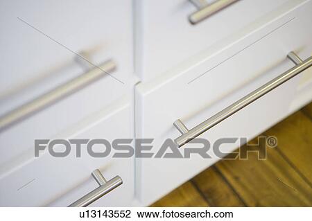 Stock Image - Detail of cabinet doors (close up). Fotosearch