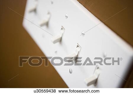 Stock Photo - Detail of light switches.. Fotosearch
