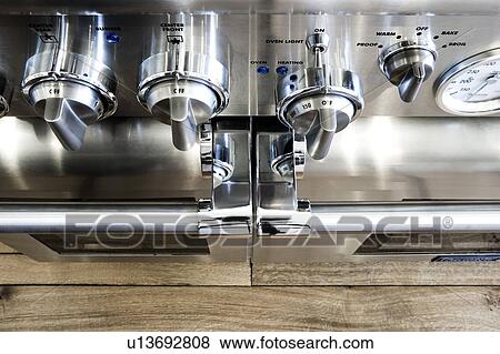 Detail of stainles steel oven controls. View Large Photo Image Stock Photo - Detail of stainles steel oven controls.. Fotosearch
