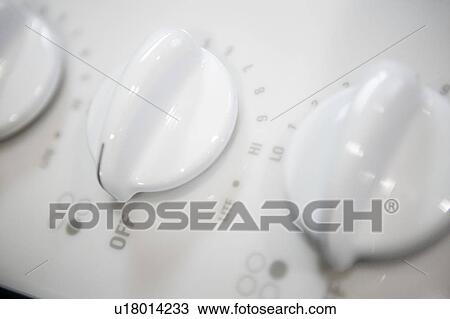 Detail of white stove knobs, close up View Large Photo Image Stock Image - Detail of white stove knobs, close up. Fotosearch