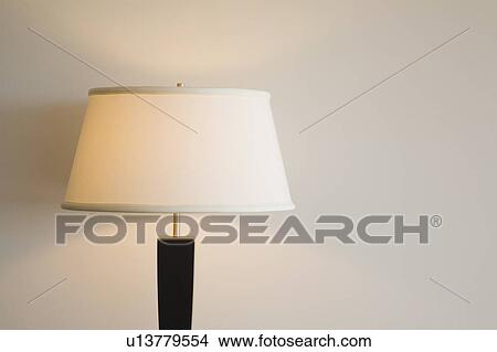 Lamp Illuminating with White Shade View Large Photo Image Picture - Lamp Illuminating with White Shade. Fotosearch