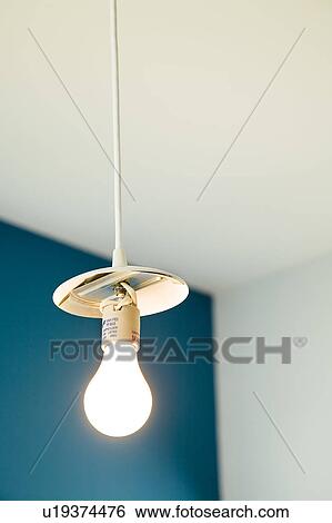 Light Bulb Hanging From White Cord View Large Photo Image Stock Photograph - Light Bulb Hanging From White Cord. Fotosearch