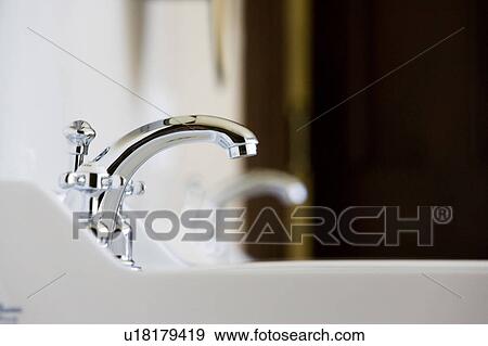 Sideview of White Sink and Chrome Faucet View Large Photo Image Stock Photo - Sideview of White Sink and Chrome Faucet. Fotosearch