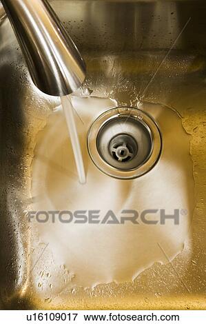 Stock Photo - Stainless steel faucet. Fotosearch