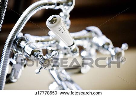 Vintage chrome bathtub faucet View Large Photo Image Stock Image - Vintage chrome bathtub faucet. Fotosearch