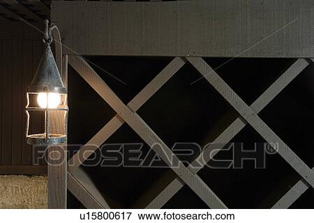 Stock Photo - Wine Cellar Rack with Lantern. Fotosearch