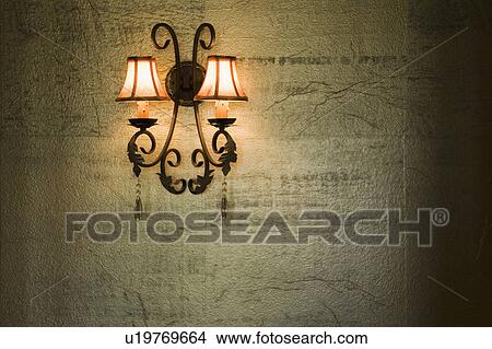 Wrought Iron Lamp on Gold Textured Wall View Large Photo Image Picture - Wrought Iron Lamp on Gold Textured Wall. Fotosearch
