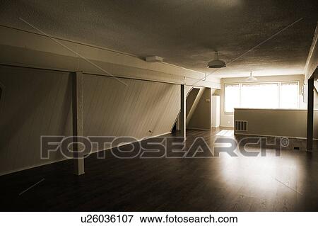 Empty Bonus Room with Bright Window View Large Photo Image Stock Photo - Empty Bonus Room with Bright Window. Fotosearch