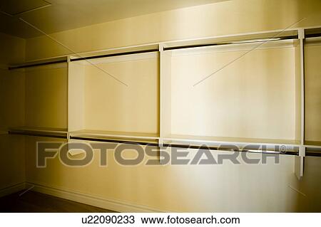 Stock Image - Empty Closet with Shelves. Fotosearch
