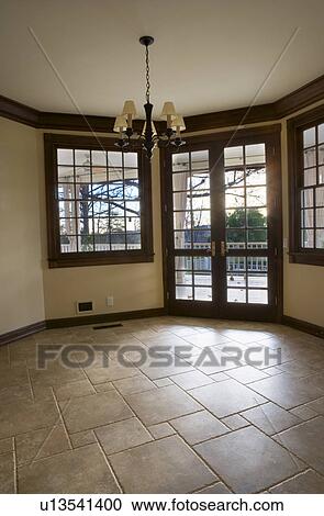 Empty Room with Tile Floor and French Doors View Large Photo Image Stock Image - Empty Room with Tile Floor and French Doors. Fotosearch