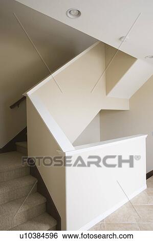 Stock Photograph - Empty white staircase. Fotosearch