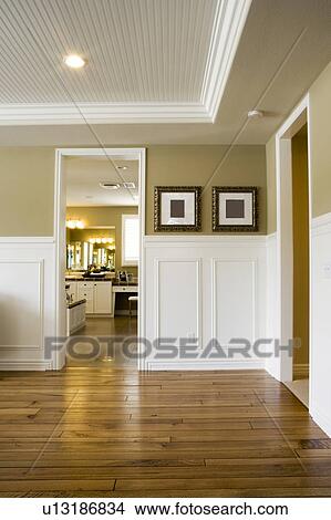 Image of empty room with wood floor looking into another room View Large Photo Image Picture - Image of empty room with wood floor looking into another room. Fotosearch