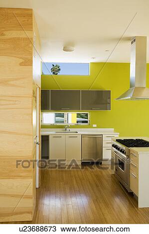 Stock Image - Modern Kitchen with Green Wall. Fotosearch