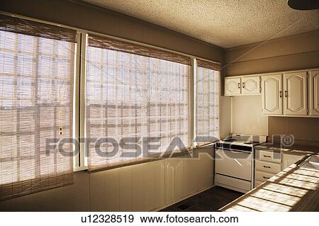 Traditional Kitchen with Large Windows View Large Photo Image Stock Photo - Traditional Kitchen with Large Windows. Fotosearch