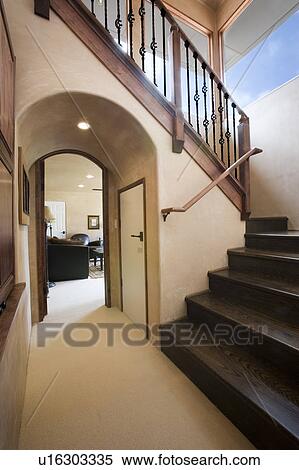 View of hallway and ascending staircase View Large Photo Image Stock Photography - View of hallway and ascending staircase. Fotosearch