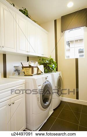 Stock Image - Contemporary Laundry Room. Fotosearch